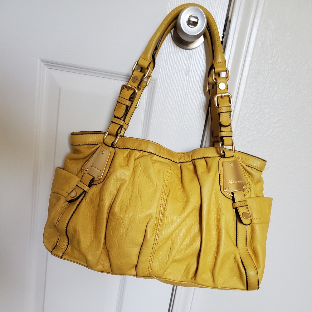 B. Makowsky Yellow Purse
